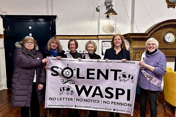 Liz stood with group of WASPI women