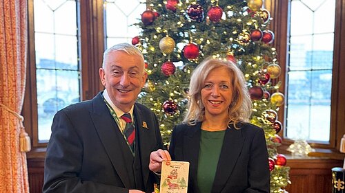 Liz and Speaker with Xmas card